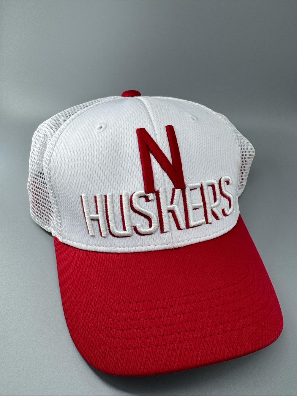 White and Red Huskers Embroidered Trucker Hat